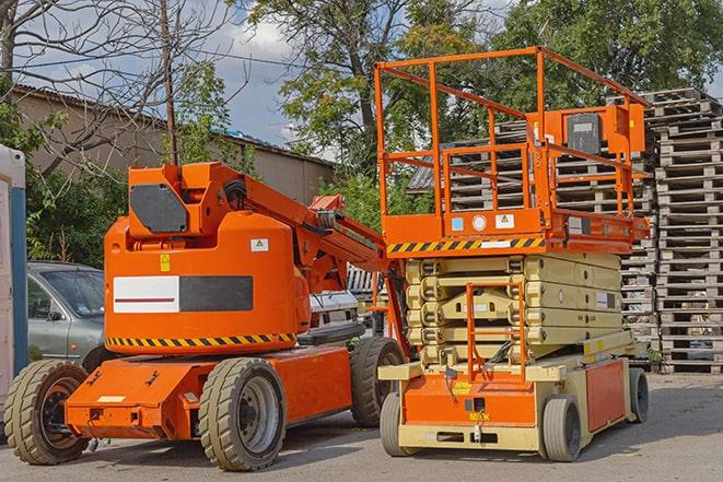 forklift carrying pallets in warehouse in Punta Gorda